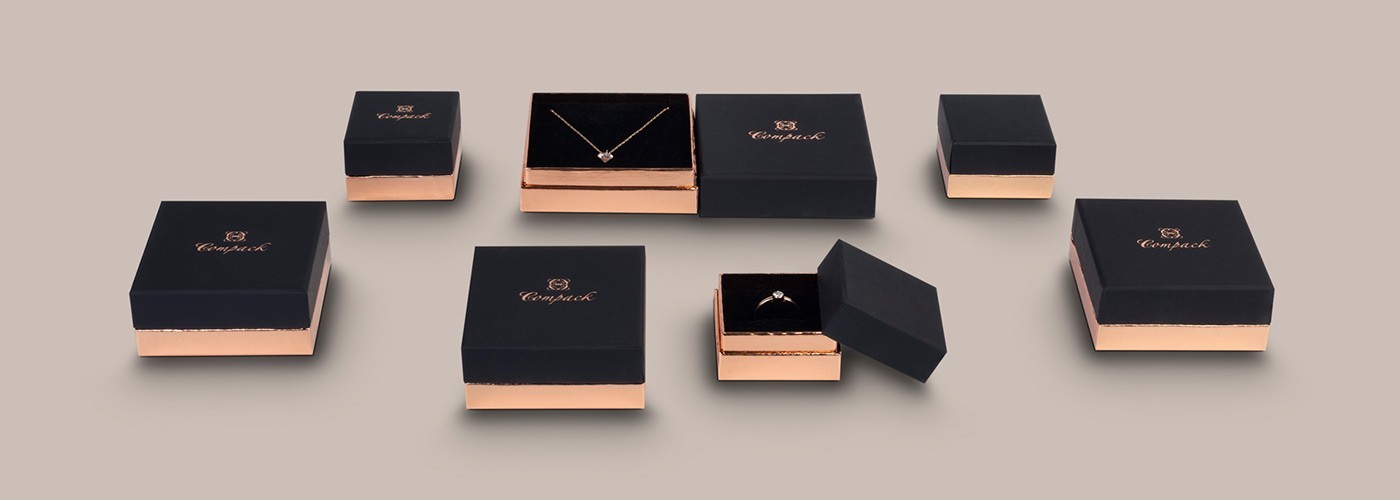 Cardboard boxes for jewelry, in black and pink gold